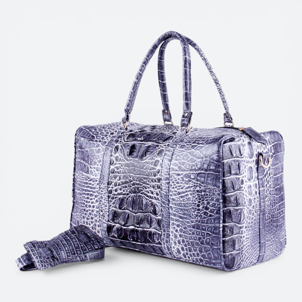 VEARI Voyage Medium Carry On bag in bicolor black genuine hornback crocodile leather with zip pockets and organizer pockets.