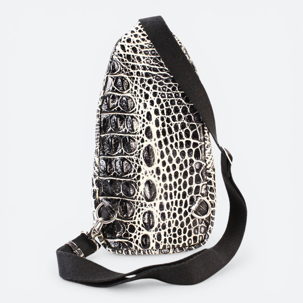 VEARI bicolor black and light brown hornback crocodile leather backpack with zip pocket and organizer pockets.