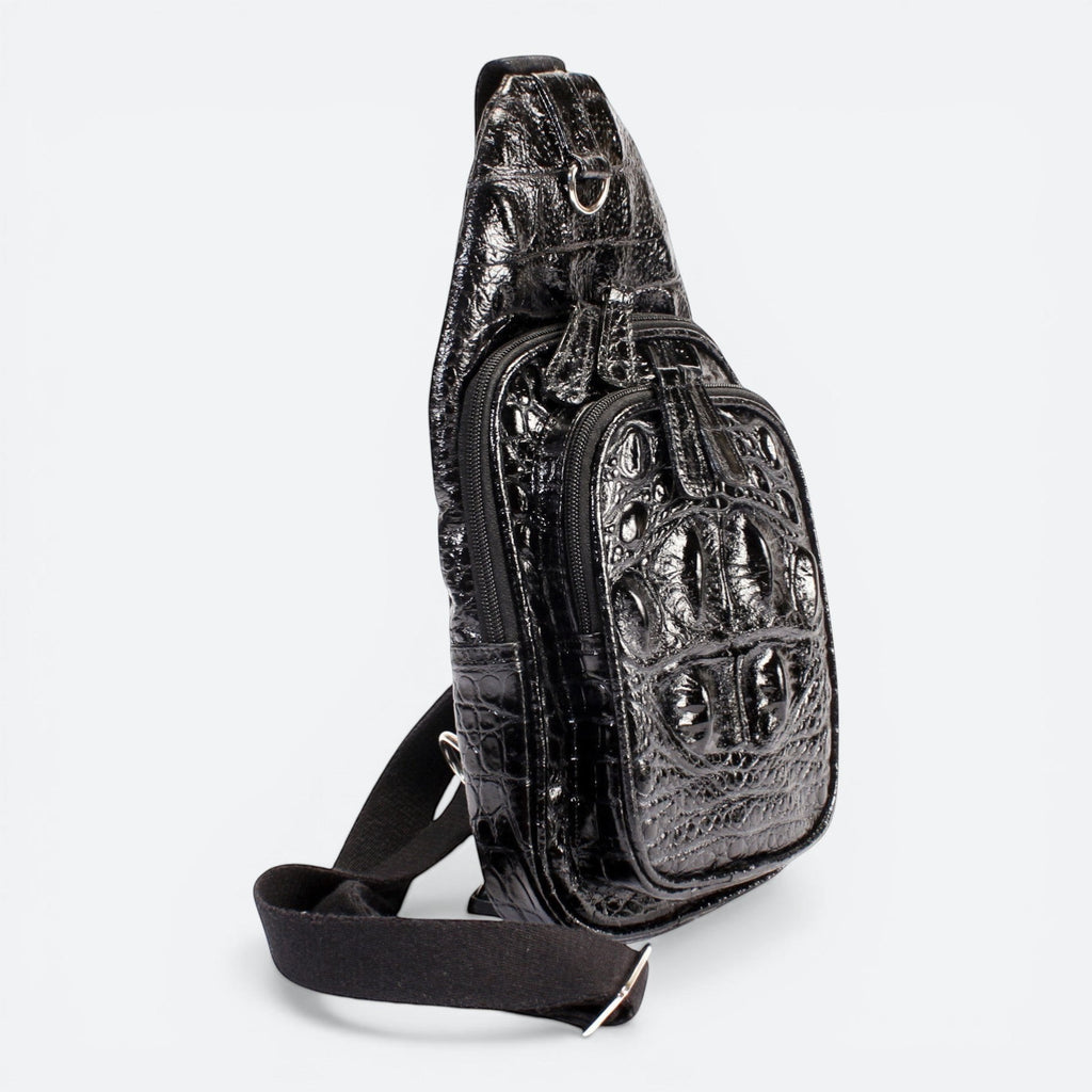 VEARI black hornback crocodile genuine leather sling backpack with zip pocket and organizer pockets.