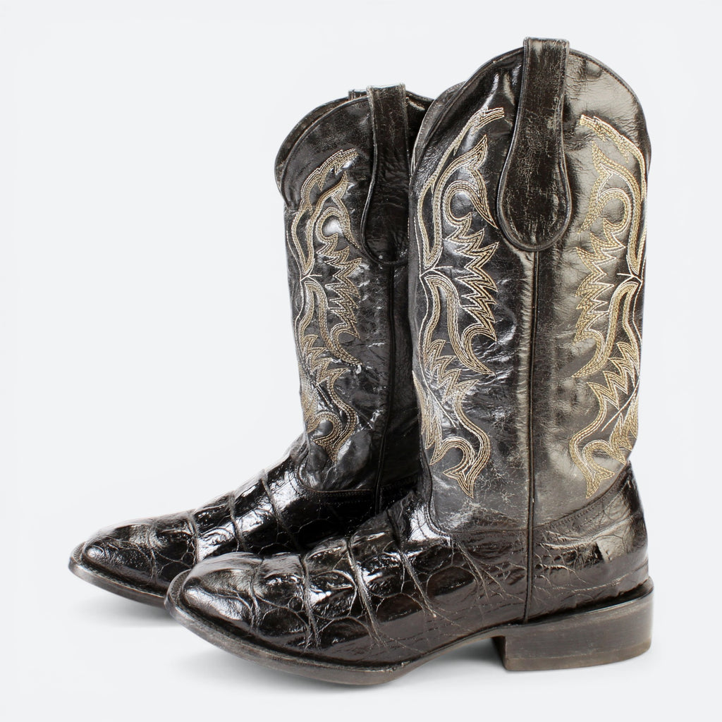 VEARI black hornback crocodile leather western boots with gold stitching and leather sole.