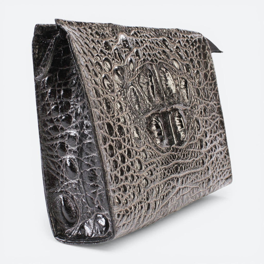 VEARI black genuine leather clutch with hornback texture, zip pocket, interior zip, and organizer pockets.