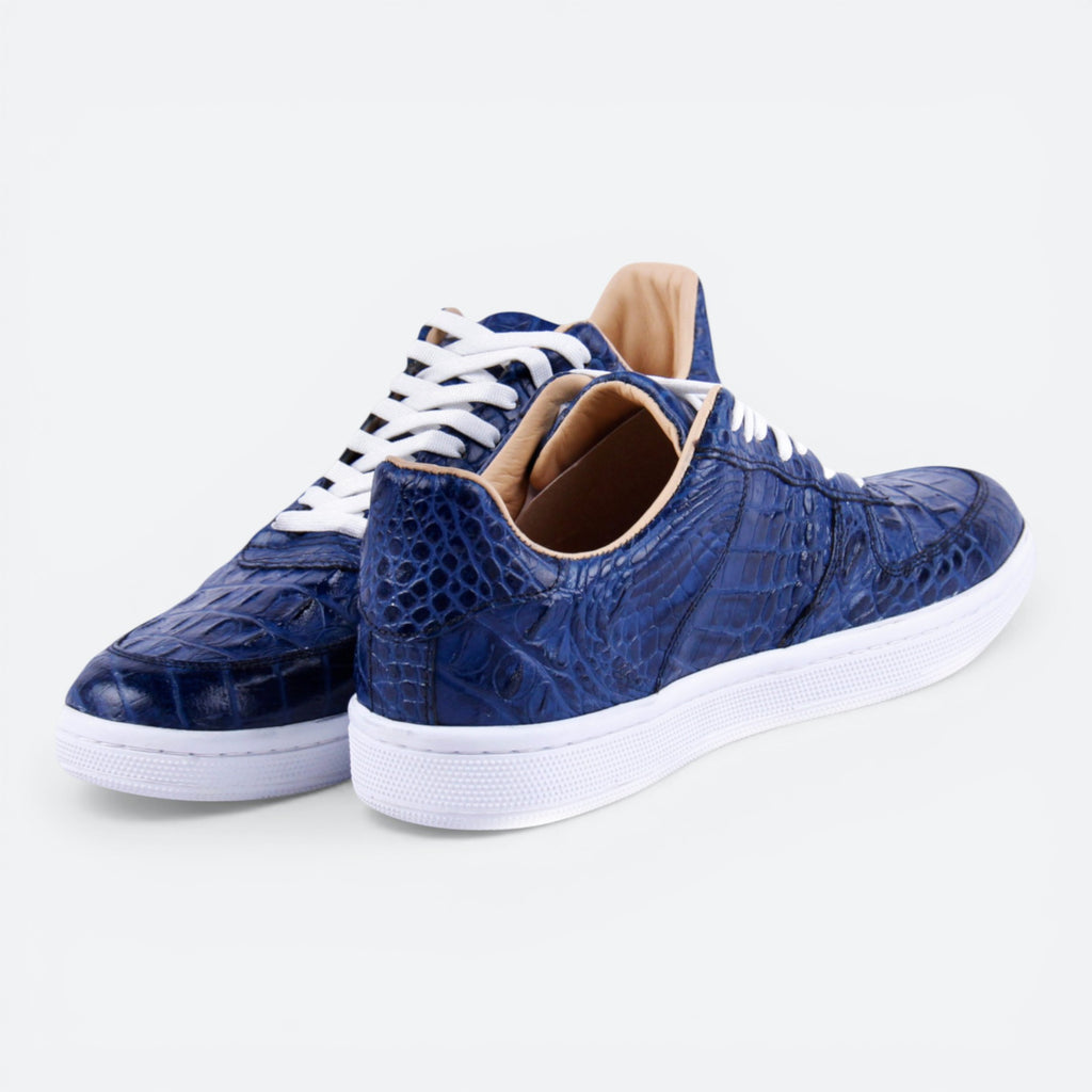 VEARI blue alligator leather low top sneakers with white laces and full leather lining.