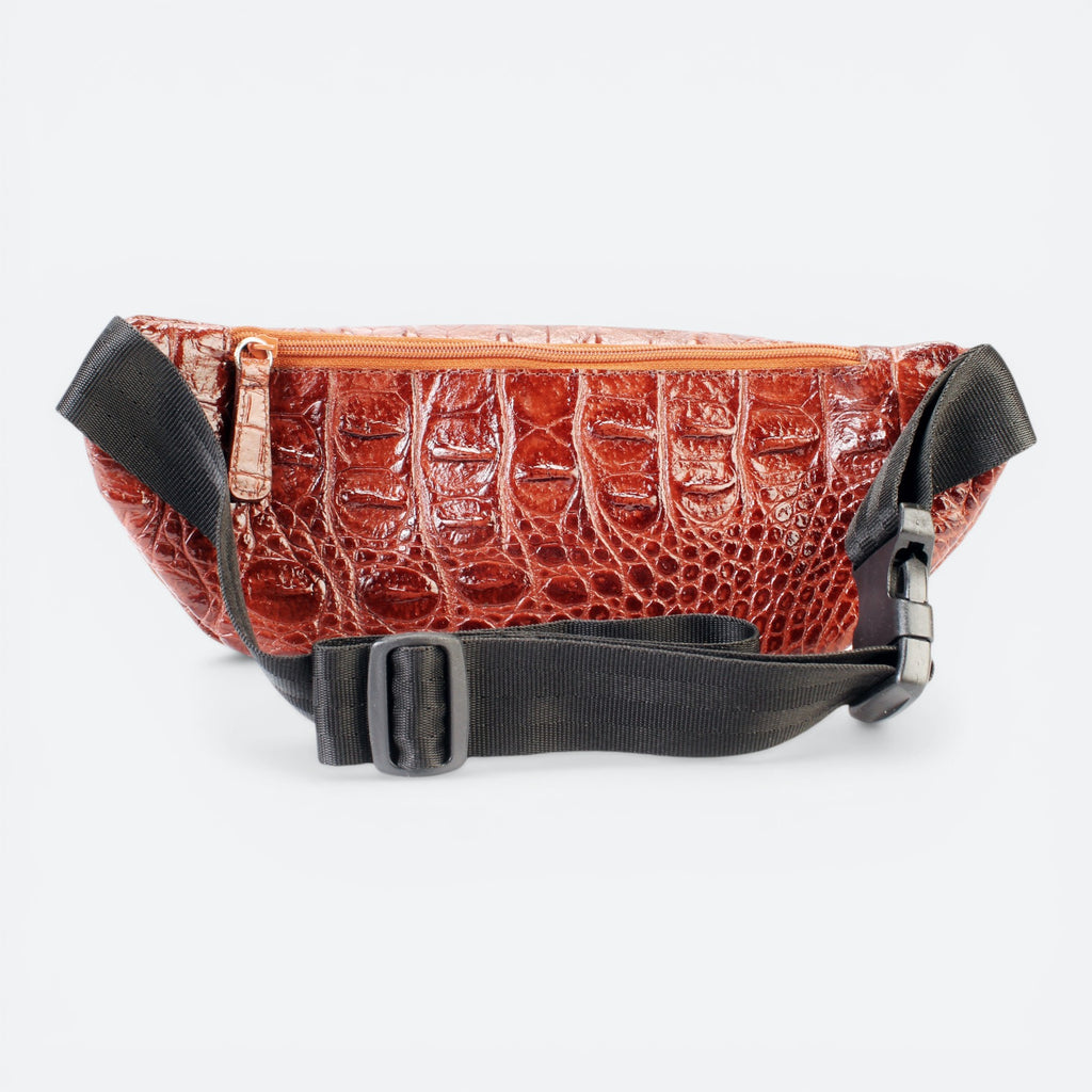 VEARI Savage fanny pack in brown genuine leather with hornback crocodile design. Features zip pocket and adjustable strap.