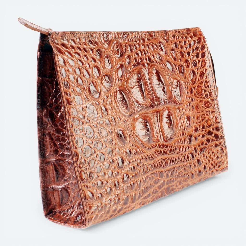 VEARI brown genuine leather travel bag with hornback texture and zip closure. Features interior zip and organizer pockets.