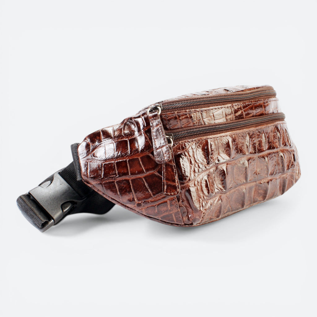 VEARI Savage fanny pack in dark brown genuine leather with crocodile texture. Features zip pockets and adjustable strap.