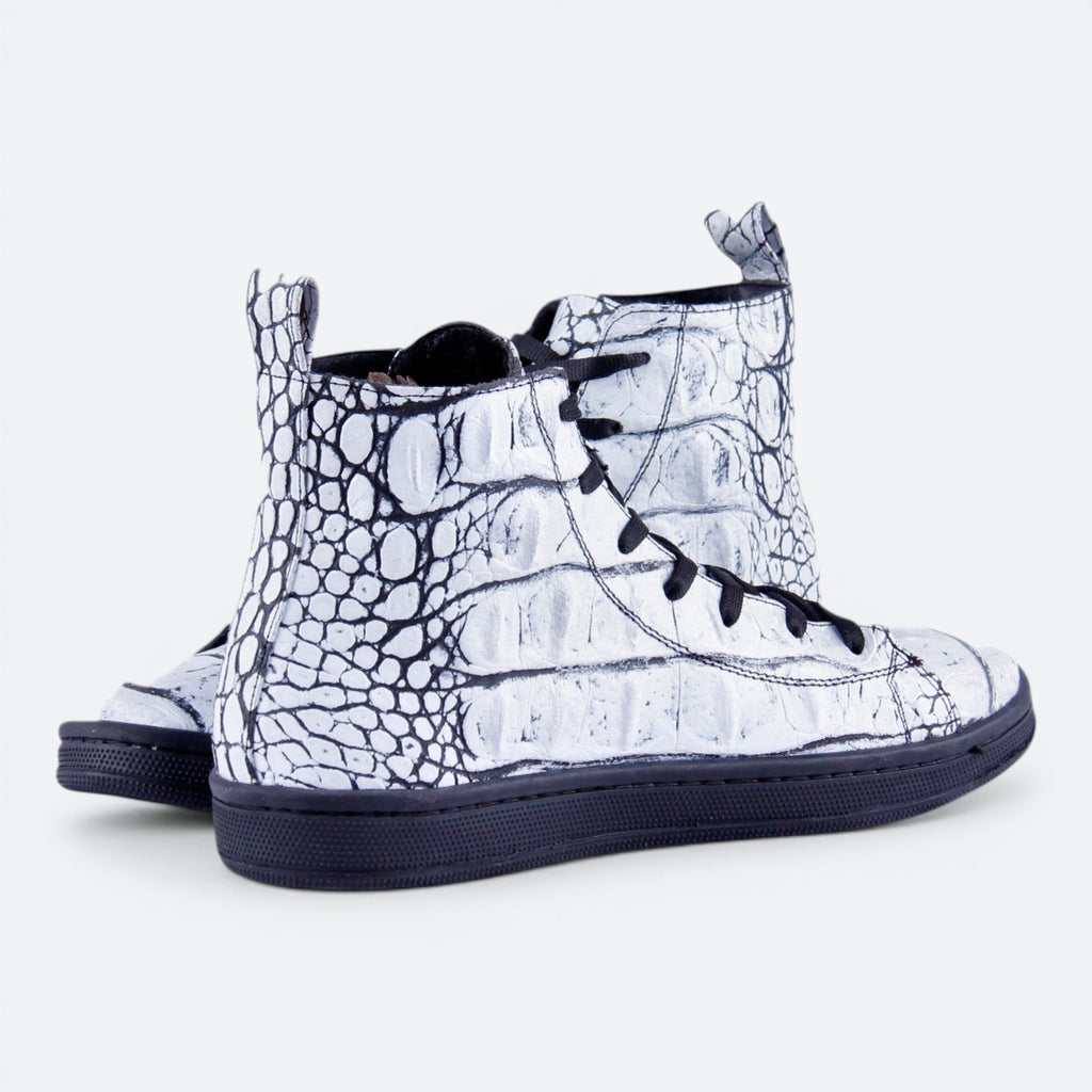 VEARI limited edition ice white alligator leather hi-top sneakers with black laces and soles.