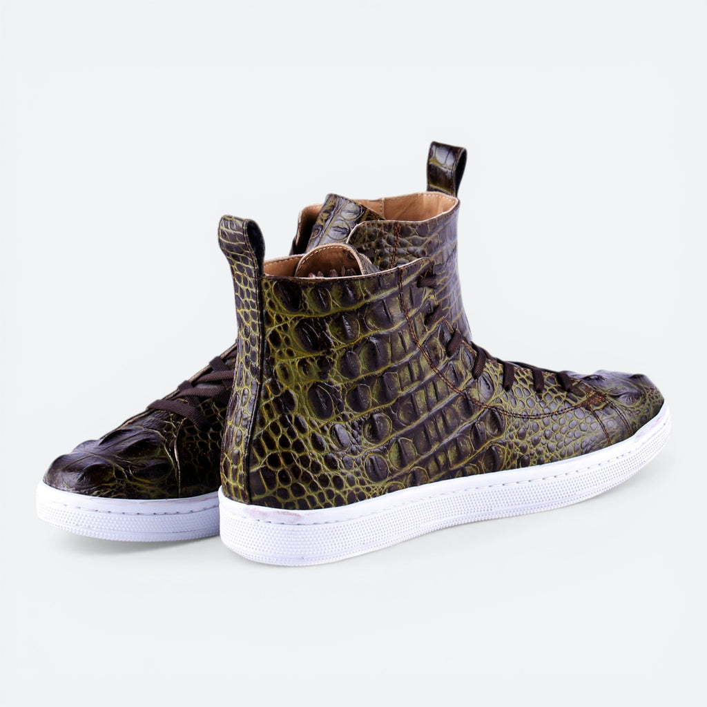 VEARI swamp green alligator leather hi-top sneakers with white soles and full leather lining.